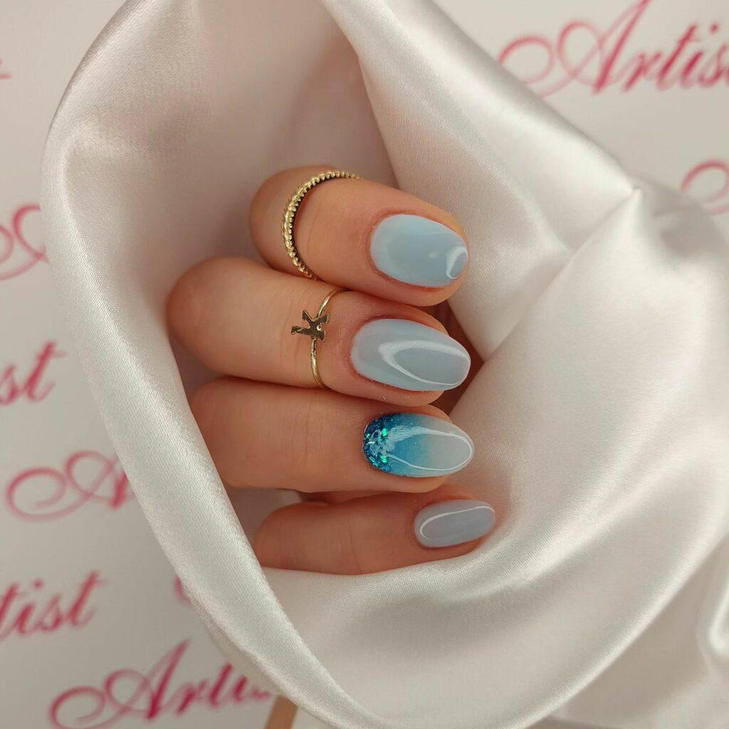 طراحی ناخن آبی روشن تابستان