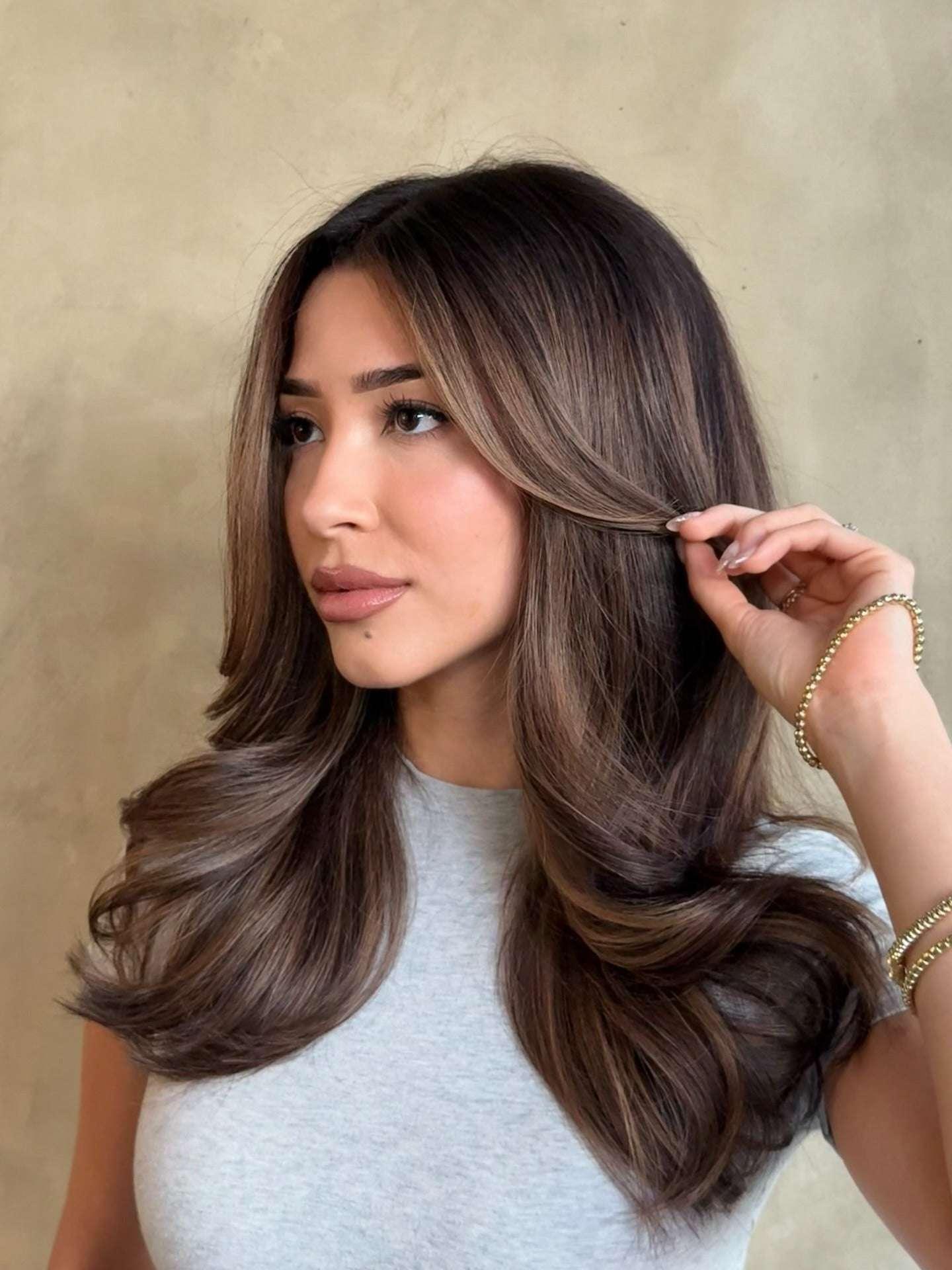 12. Ash Brown Layers with Face-Framing Flow (مدل رنگ مو قهوه ای)