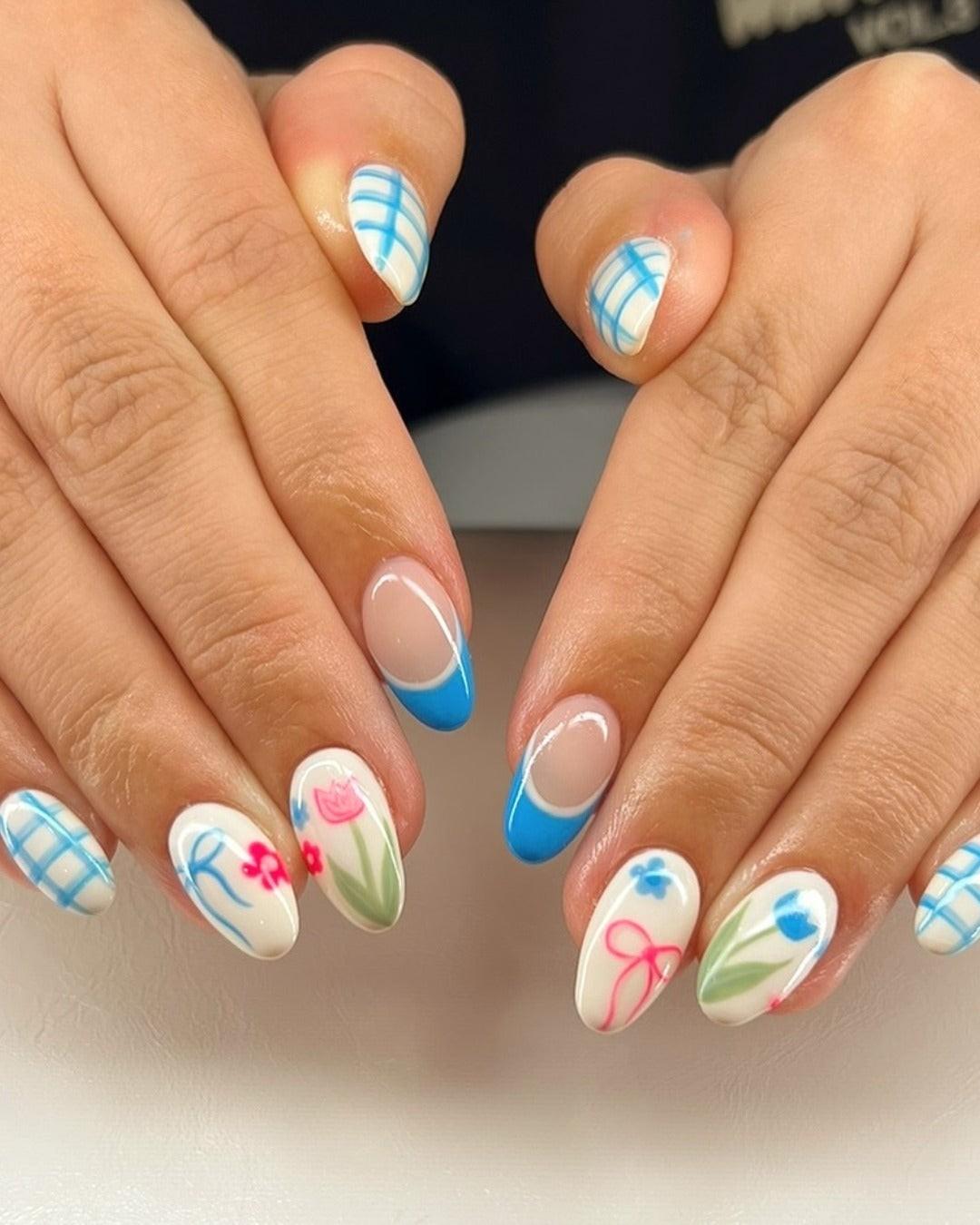 1. Blue French & Floral Accents (Trendy Simple Nail Ideas) - مدل ناخن ساده و شیک