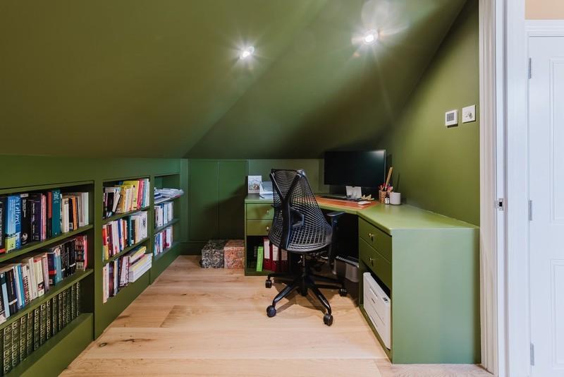طراحی دفتر کار زیرشیروانی: Deep Olive Green Built-In Loft Office with Integrated Storage