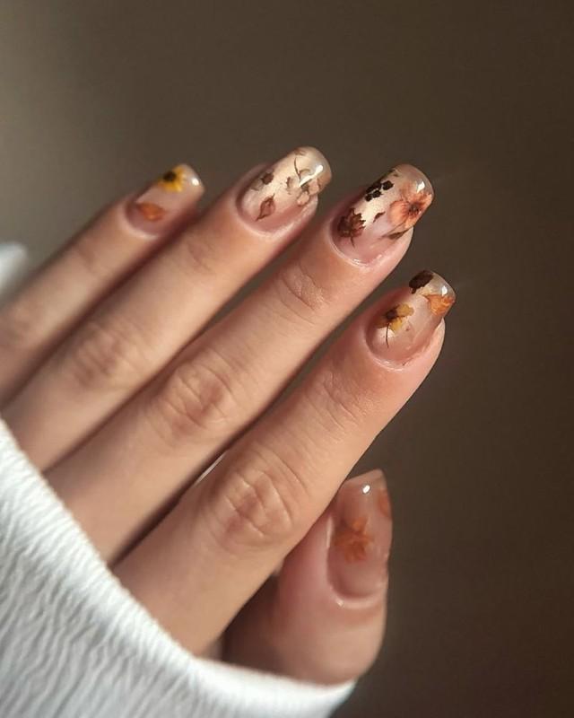 طراحی ناخن پاییزی چشم گربه ای نود واقع گرایانه